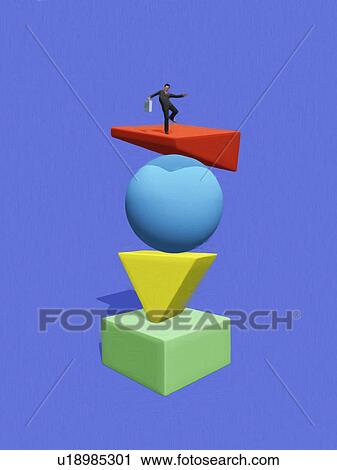 Stack of different shaped toy blocks and businessman figurine on top View Large Photo Image Stock Image - Stack of different shaped toy blocks and businessman figurine on top. Fotosearch