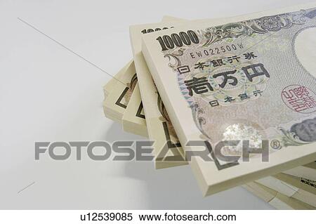 Stock Photography - Stack of Japanese money. Fotosearch