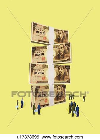 Stock Photography - Stack of Japanese yen and businessmen figurines. Fotosearch