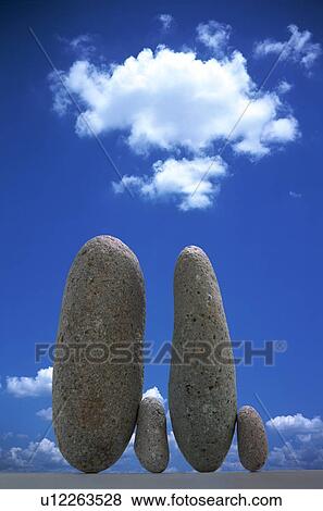 Stones under a blue sky View Large Photo Image Stock Photo - Stones under a blue sky. Fotosearch