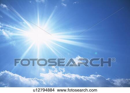 Sun, blue sky and clouds View Large Photo Image Picture - Sun, blue sky and clouds. Fotosearch
