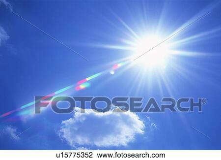 Stock Image - Sun, blue sky and clouds. Fotosearch