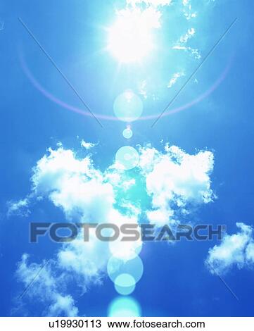 Sun, blue sky and clouds View Large Photo Image Stock Image - Sun, blue sky and clouds. Fotosearch