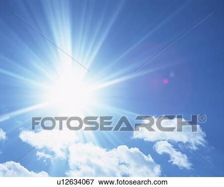 Sun, blue sky and clouds View Large Photo Image Stock Photo - Sun, blue sky and clouds. Fotosearch