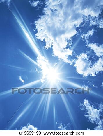 Sun, blue sky and clouds View Large Photo Image Stock Photo - Sun, blue sky and clouds. Fotosearch