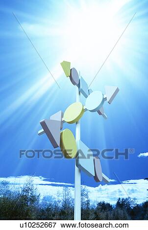 Stock Photo - Sun shining on signpost. Fotosearch