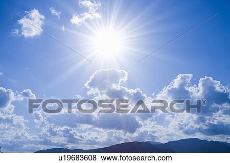 Sun shining over mountain range, Moriyama, Shiga Prefecture, Japan View Large Photo Image Stock Photo - Sun shining over mountain range, Moriyama, Shiga Prefecture, Japan. Fotosearch