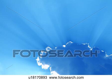 Sunbeams coming from behind cloud View Large Photo Image Stock Image - Sunbeams coming from behind cloud. Fotosearch