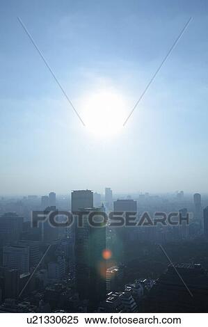 Sunlight over office buildings, Tokyo prefecture, Japan View Large Photo Image Stock Photography - Sunlight over office buildings, Tokyo prefecture, Japan. Fotosearch