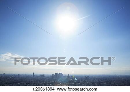 Sunlight over Tokyo city, Tokyo prefecture, Japan View Large Photo Image Picture - Sunlight over Tokyo city, Tokyo prefecture, Japan. Fotosearch