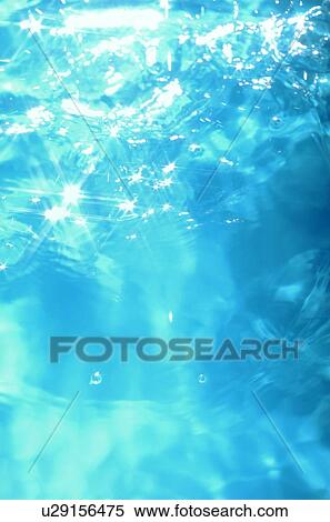 Sunlight reflecting off water surface View Large Photo Image Stock Photography - Sunlight reflecting off water surface. Fotosearch