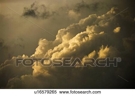 Sunlight Shining on Dark Clouds View Large Photo Image Stock Photography - Sunlight Shining on Dark Clouds. Fotosearch