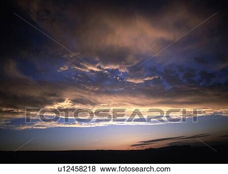 Stock Photo - Sunrise Color and Cloud. Fotosearch