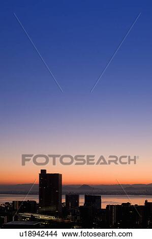 Picture - Sunrise over a City. Otsu, Shiga Prefecture, Japan. Fotosearch