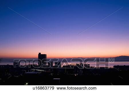 Stock Photo - Sunrise over a City. Otsu, Shiga Prefecture, Japan. Fotosearch