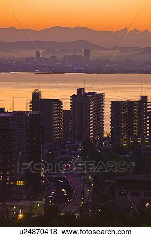 Stock Photo - Sunrise over a City. Otsu, Shiga Prefecture, Japan. Fotosearch