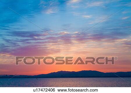 Stock Photograph - Sunrise over Lake Biwa. Otsu, Shiga Prefecture, Japan. Fotosearch