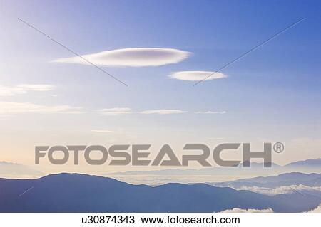 Stock Image - Sunrise over mountain range, Mt Norikura, Matsumoto, Nagano Prefecture, Japan. Fotosearch