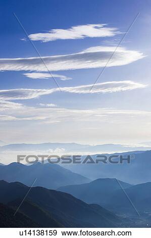 Stock Photo - Sunrise over mountain range, Mt Norikura, Matsumoto, Nagano Prefecture, Japan. Fotosearch