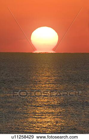 Stock Photo - Sunrise Over the Horizon. Fotosearch