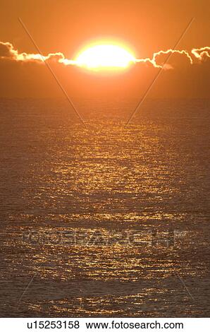 Stock Photo - Sunrise Over the Horizon. Fotosearch