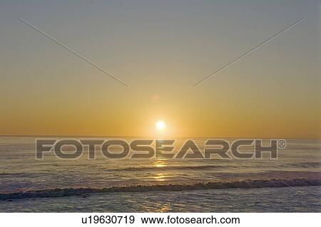 Stock Photo - Sunrise Over the Horizon. Fotosearch