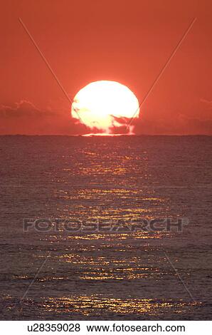 Stock Photo - Sunrise Over the Horizon. Fotosearch