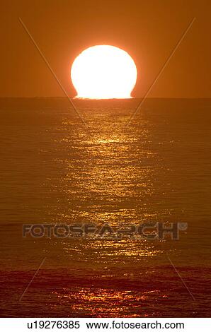 Stock Photography - Sunrise Over the Horizon. Fotosearch