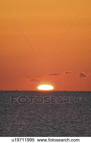 Stock Photography - Sunrise Over the Horizon. Fotosearch