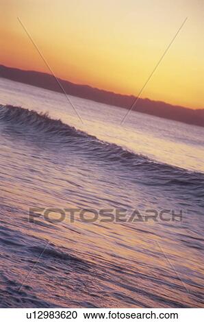 Stock Image - Sunrise over the sea. Kanagawa Prefecture, Japan. Fotosearch