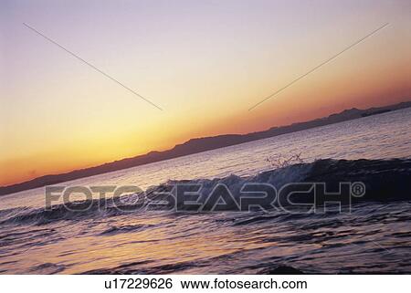 Sunrise over the sea. Kanagawa Prefecture, Japan View Large Photo Image Stock Photograph - Sunrise over the sea. Kanagawa Prefecture, Japan. Fotosearch