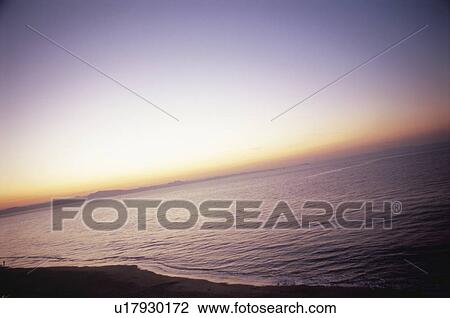 Stock Image - Sunrise over the sea. Miura Peninsula, Kanagawa Prefecture, Japan. Fotosearch
