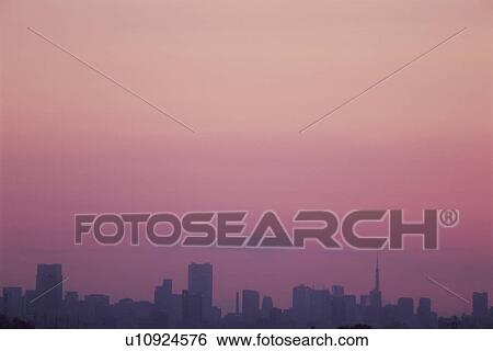 Stock Photograph - Sunrise over Tokyo. Tokyo Prefecture, Japan. Fotosearch