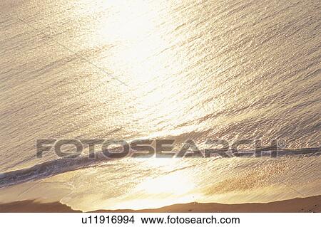Picture - Sunrise reflected on the sea. Miura Peninsula, Kanagawa Prefecture, Japan. Fotosearch