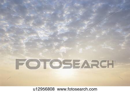 Sunrise turning clouds golden, Miura Peninsula, Kanagawa Prefecture, Japan View Large Photo Image Stock Photo - Sunrise turning clouds golden, Miura Peninsula, Kanagawa Prefecture, Japan. Fotosearch