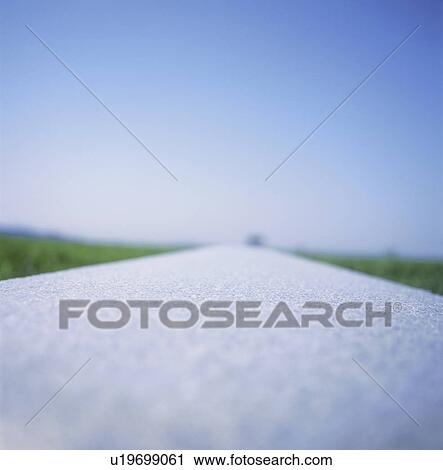 Stock Image - Surface level of road. Fotosearch