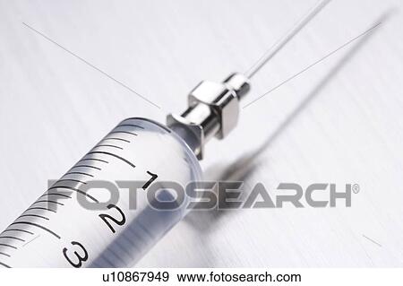 Syringe with needle View Large Photo Image Stock Photo - Syringe with needle. Fotosearch