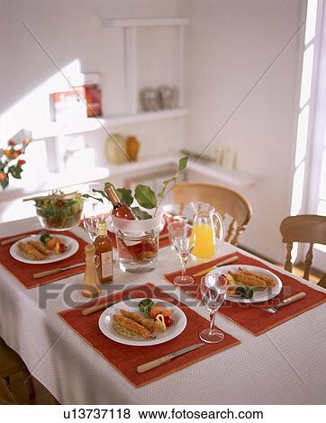 Stock Photo - Table arrangement with four meals. Fotosearch