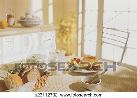 Stock Image - Table set for breakfast. Fotosearch