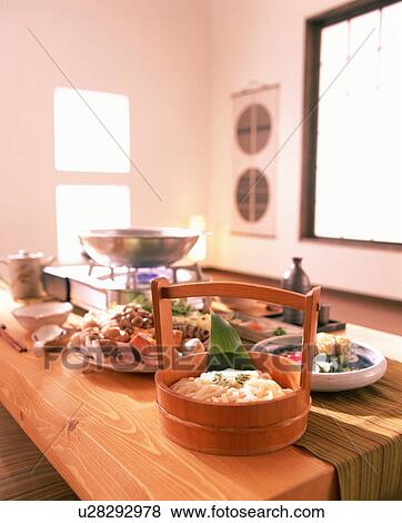 Stock Photo - Table with cooker and ingredients. Fotosearch