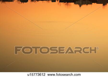 Stock Image - Tama river in sunset color, copy space, Tokyo prefecture, Japan. Fotosearch