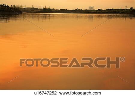 Tama river in sunset color, copy space, Tokyo prefecture, Japan View Large Photo Image Stock Image - Tama river in sunset color, copy space, Tokyo prefecture, Japan. Fotosearch
