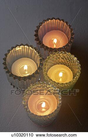 Tealight candles in glass holders View Large Photo Image Stock Image - Tealight candles in glass holders. Fotosearch