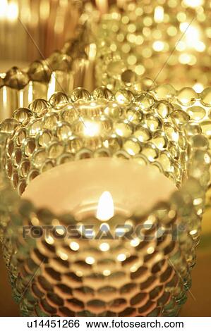 Tealight candles in glass holders View Large Photo Image Stock Photograph - Tealight candles in glass holders. Fotosearch