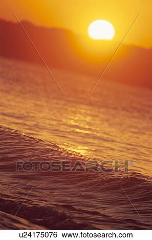 Stock Photograph - The sea at sunrise. Kanagawa Prefecture, Japan. Fotosearch