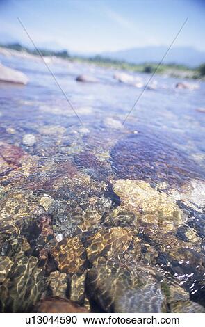 Stock Image - The stream of Okawa. Aizumisato, Fukushima Prefecture, Japan. Fotosearch