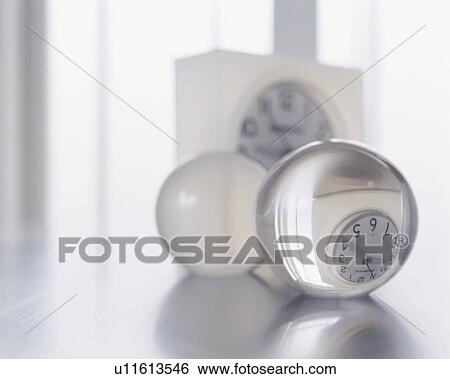 Time reflected in glass sphere - digital composite View Large Photo Image Stock Photograph - Time reflected in glass sphere - digital composite. Fotosearch