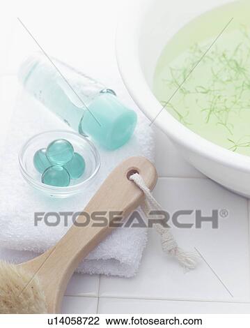 Stock Image - Toiletries on towel, close up. Fotosearch