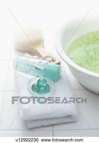 Stock Image - Toiletries on towel. Fotosearch