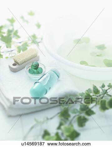 Stock Photo - Toiletries on towel. Fotosearch